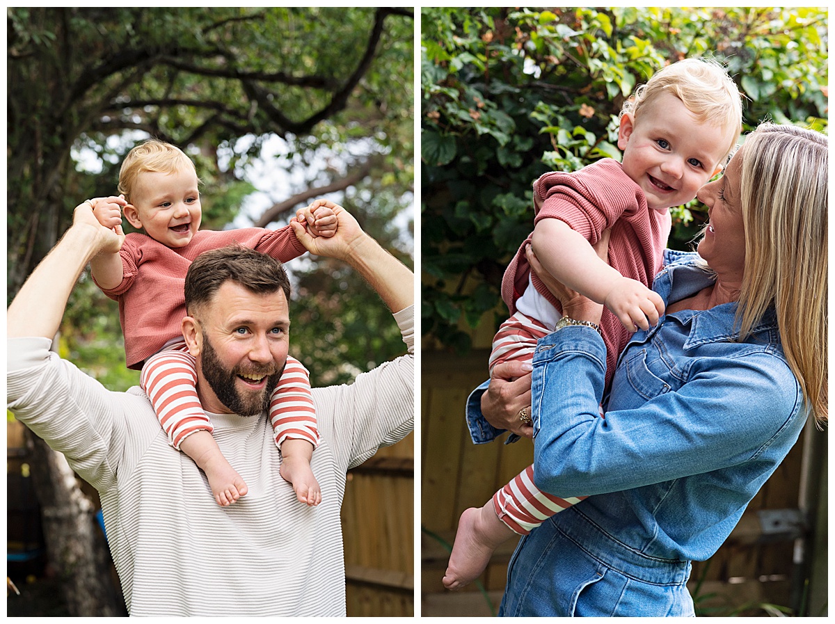 A one year old sitting on his dad's shoulders as he poses for a first birthday photo shoot