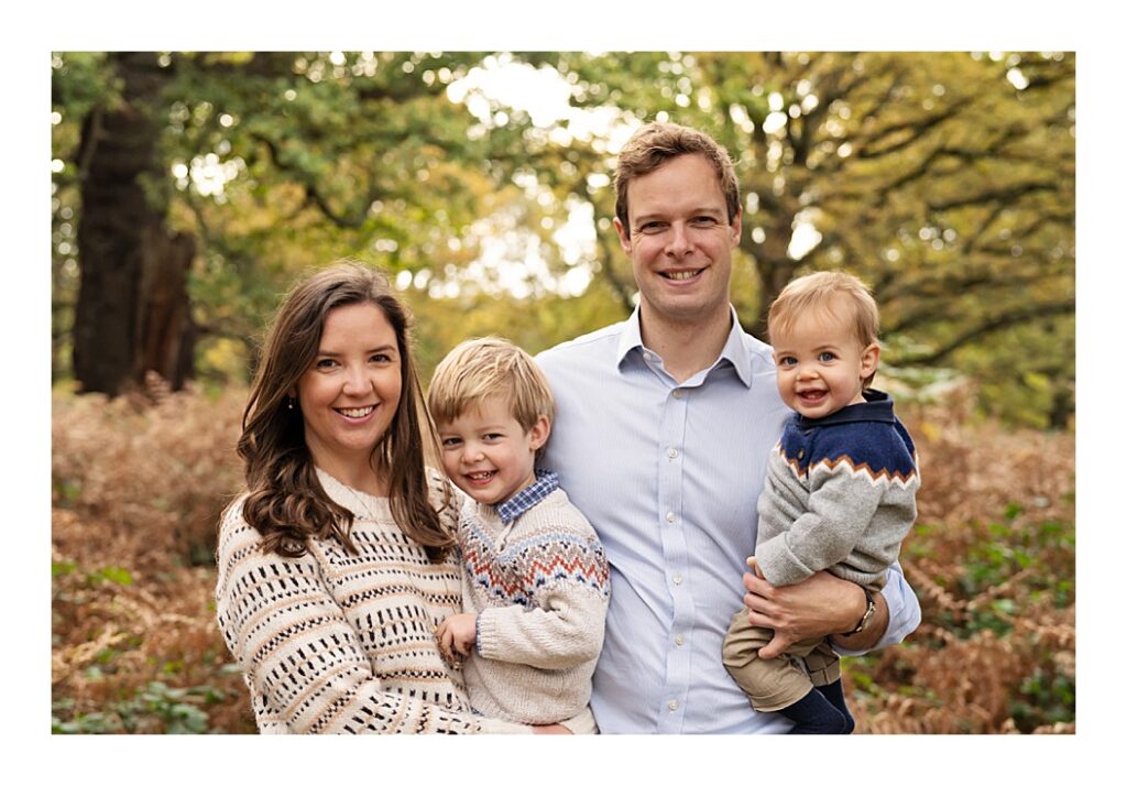 A picture of a family dressed in earthy organic clothes for an Autumn Family Photoshoot 